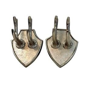 Silver tone textured metal faux antler wall plaques set of two